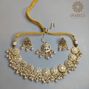 Ivory white mother of pearl MOP gold plated necklace set with pearl drops earrings and maangtikka by The Sparkle Jewellery
