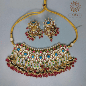 Turquoise blue Jadau Pachi Kundan gold plated choker set with ruby red drops and matching earrings by The Sparkle Jewellery