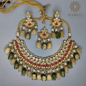 Ruby red and bottle green Jadau kundan gold plated necklace set with pearl drops and earrings by The Sparkle Jewellery