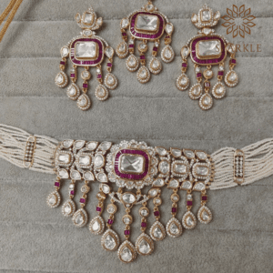 Polki and baguette stone choker set with earrings in ruby pink classic white and emerald green gold plated by The Sparkle Jewellery