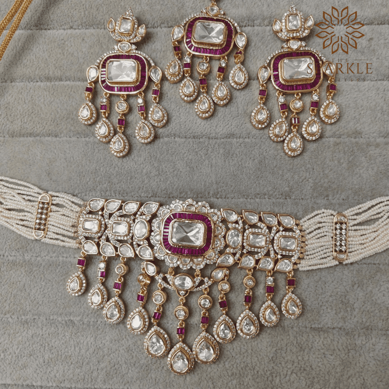 Polki and baguette stone choker set with earrings in ruby pink classic white and emerald green gold plated by The Sparkle Jewellery