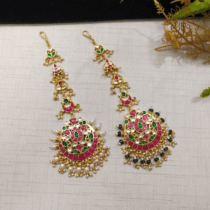 Jadau Pachi Kundan gold-plated earrings handcrafted with ruby, emerald, and pearl detailing by The Sparkle Jewellery – premium Indian jewellery with worldwide shipping.