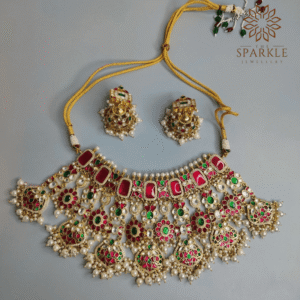 Ruby red and emerald green Jadau pachi kundan gold plated bridal necklace set with pearl drops by The Sparkle Jewellery
