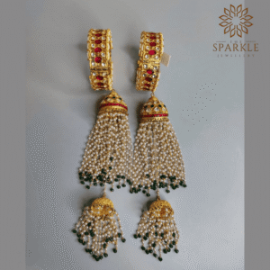 Ruby red Jadau kundan gold plated bridal bangles with pearl and emerald green kalire by The Sparkle Jewellery