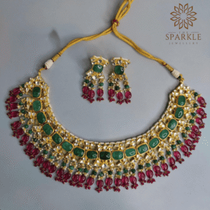 Emerald green and ruby red Jadau pachi kundan 22k gold plated necklace set with earrings by The Sparkle Jewellery