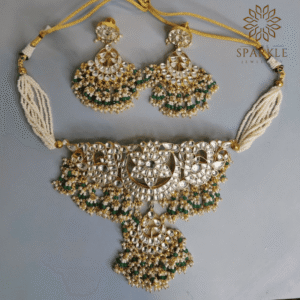 Emerald green Jadau Pachi Kundan 22K gold plated heavy choker set with matching earrings by The Sparkle Jewellery