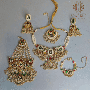 Multicolour Jadau Pachi Kundan 22K gold plated bridal jewellery set with choker earrings passa maangtikka and nose ring by The Sparkle Jewellery