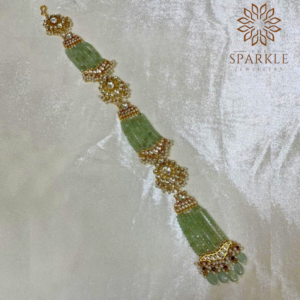 Mint green Pachi Kundan Jadau hathphool with layered bead tassels in 22K gold plating by The Sparkle Jewellery