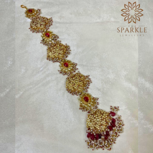 Royal red Pachi Kundan Jadau hathphool with pearl clusters and ruby tone drops in 22K gold plating by The Sparkle Jewellery