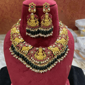 temple style jadau pachi kundan 18k gold plated necklace set goddess lakshmi motif dark green drops luxury indian jewellery worldwide