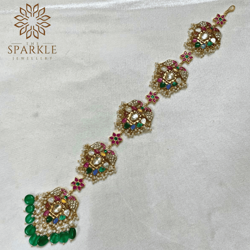 Multicolor jadau kundan 18K gold plated hair braid jewellery with green bead drops pearl clusters and ruby pink accents by The Sparkle Jewellery