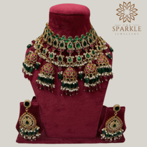 The Sparkle Jewellery pachi kundan jadau gold plated bridal necklace set with green and ruby stones and matching earrings
