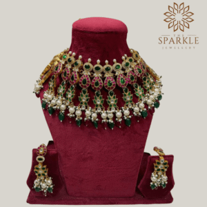 The Sparkle Jewellery green ruby jadau pachi kundan gold plated bridal necklace set with pearl drops and matching earrings