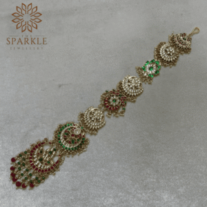 jadau pachi kundan hair braid jewellery ruby red bead drops emerald green stones champagne white kundan pearl detailing 18k gold plated the sparkle jewellery