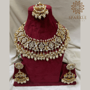 The Sparkle Jewellery mother of pearl jadau pachi kundan gold plated necklace set with pearl drop earrings