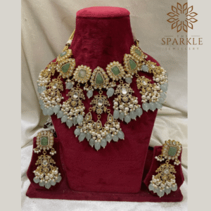 The Sparkle Jewellery mint green pearl drop jadau pachi kundan gold plated bridal necklace set with matching earrings