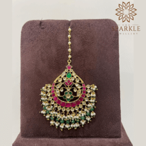 Rani pink and emerald green pachi jadau kundan maang tikka with off white ivory kundan stones pearl clusters 22k gold plated by The Sparkle Jewellery