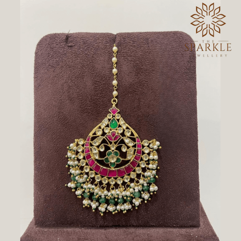 Rani pink and emerald green pachi jadau kundan maang tikka with off white ivory kundan stones pearl clusters 22k gold plated by The Sparkle Jewellery