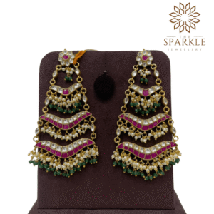Heritage ruby pink pachi kundan jadau layered chandelier earrings with emerald green bead clusters pearl detailing 22k gold plated jewellery by The Sparkle Jewellery