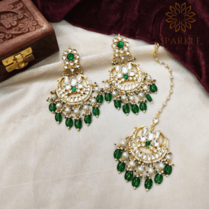 The Sparkle Jewellery jadau kundan gold plated earrings and maang tikka set with green bead drops and pearl detailing