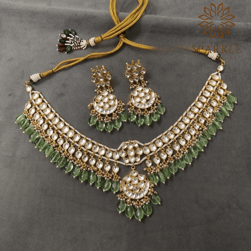 The Sparkle Jewellery jadau pachi kundan gold plated necklace set with soft green bead drops and matching earrings