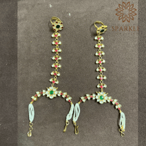 Off white ruby pink emerald green pachi jadau kundan hathphool hand harness with pearl bracelet chains 22k gold plated jewellery by The Sparkle Jewellery