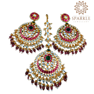 Oversized rani pink and emerald green pachi jadau kundan earrings and maang tikka set with wine bead drops 22k gold plated by The Sparkle Jewellery