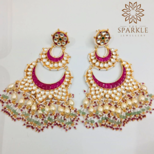 Oversized white Pachi Kundan chandbali earrings with rani pink crescent design, pearl drops and mint bead detailing in 22K gold plating by The Sparkle Jewellery