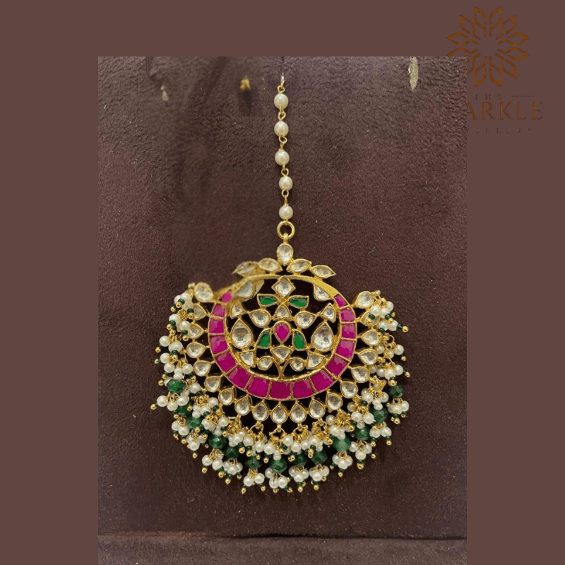 Rani pink emerald green pachi jadau kundan maang tikka with off white ivory kundan stones pearl cluster detailing 22k gold plated jewellery by The Sparkle Jewellery