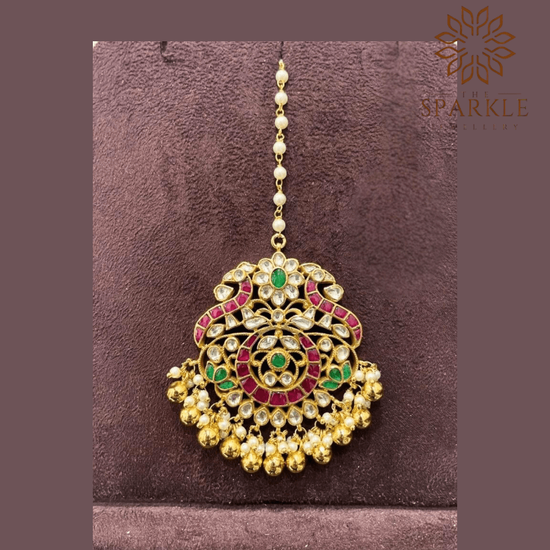 Rani pink emerald green pachi jadau kundan maang tikka with off white ivory kundan stones pearl clusters and antique gold ball drops 22k gold plated by The Sparkle Jewellery
