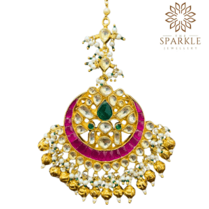 Rani pink emerald green pachi jadau kundan maang tikka with off white ivory kundan stones pearl cluster and gold ball drops 22k gold plated jewellery by The Sparkle Jewellery
