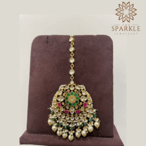 Emerald green and rani pink pachi jadau kundan maang tikka with off white ivory kundan stones pearl drops 22k gold plated by The Sparkle Jewellery