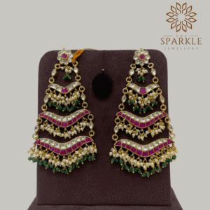 Heritage ruby pink pachi kundan jadau layered chandelier earrings with emerald green bead clusters pearl detailing 22k gold plated jewellery by The Sparkle Jewellery