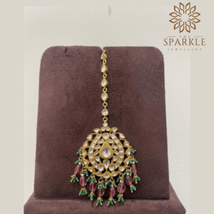 Wine pink and emerald green pachi jadau kundan maang tikka with off white ivory kundan stones 22k gold plated by The Sparkle Jewellery