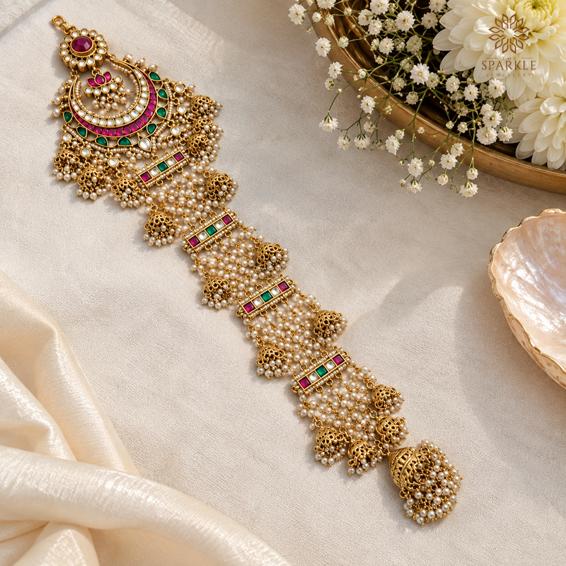 Multicolour Kundan pearl gold-plated Indian bridal hair braid jewellery with pink and green stones by The Sparkle Jewellery.